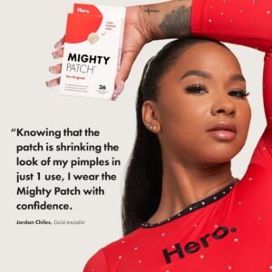 Black woman holding Hero Cosmetics Mighty Patch box 36 count original nighttime acne pimple patches